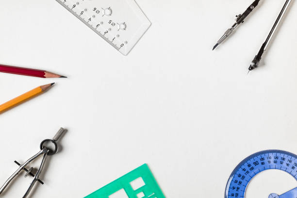 istock pencil rulers and protractor on the table as items for students and engineers 1220904469