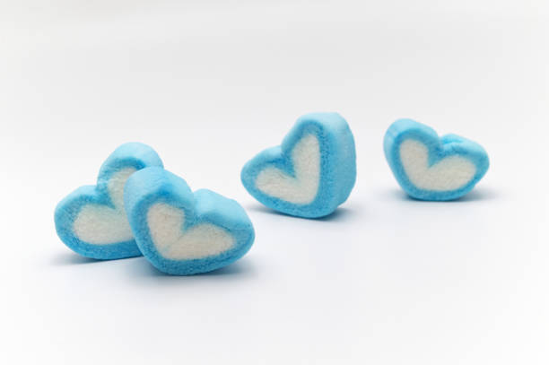 istock Blue sweet heart shape marshmallow isolated on white background. 1220905044