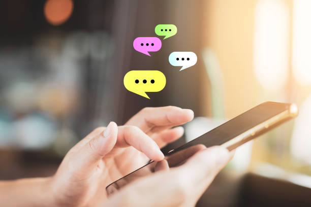 istock Woman hand using smart phone at coffee shop with email icon flying and line dot abstract. 1220907166
