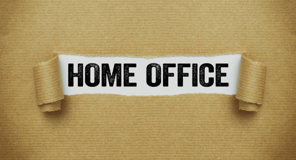 istock Torn paper revealing the words Home office 1220908127