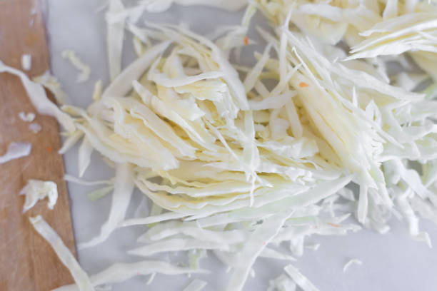 Vegetables: slice of Cabbage on marble background Vegetables: slice of Cabbage on marble background white cabbage stock pictures, royalty-free photos & images