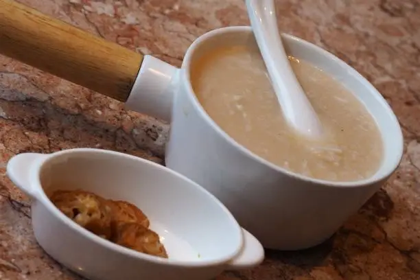 Photo of Porridge with sliced fried dough stick