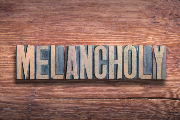 istock melancholy word wood 1220914213