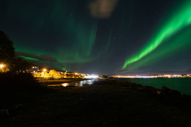 istock Northern lights display over northern Norway, Tromso 1220918021
