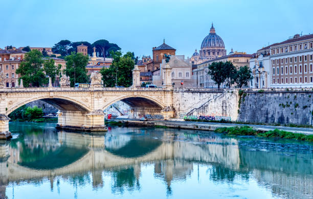 istock Emanuele II bridge and St. Peter's Basilica - Rome, Italy 1220918905