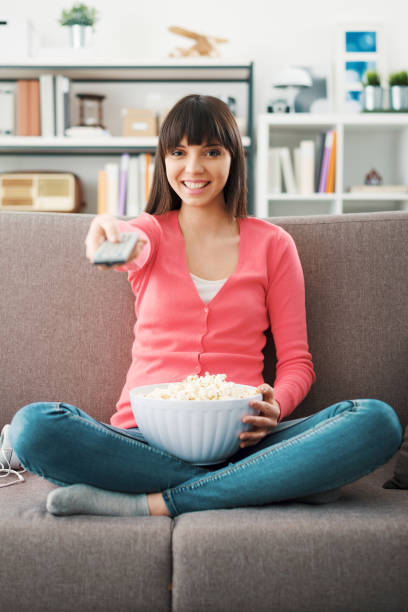 istock Woman watching tv 1220919494