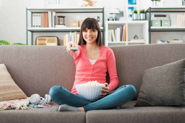 istock Woman watching tv 1220919589
