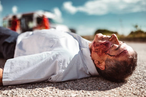 istock man lying down on the ground after the injury 1220920246