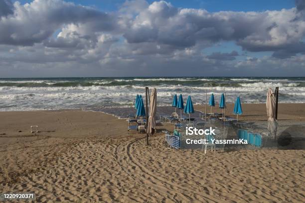 Empty Beach In The Autumn Crete Greece Stock Photo - Download Image Now - Greece, Rain, Storm