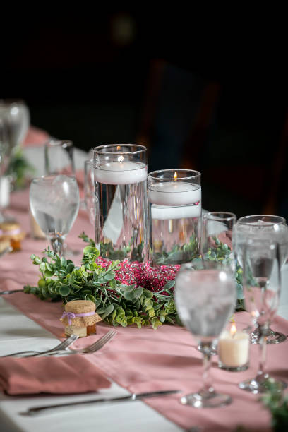 istock Indoor table setting for a wedding ceremony in the evening 1220922506