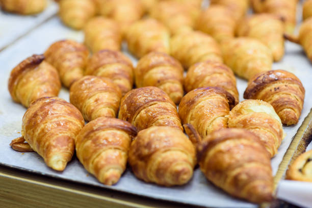 istock Freshly baked French croissants at a bakery 1220924963