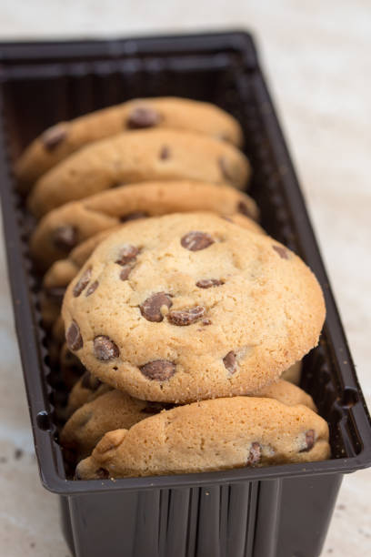 istock Brown biscuits cookies with chocolate parts 1220925037