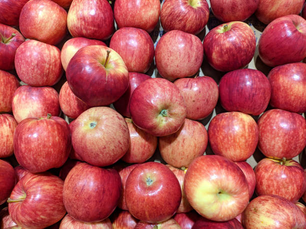 istock small red apples in a market 1220938055