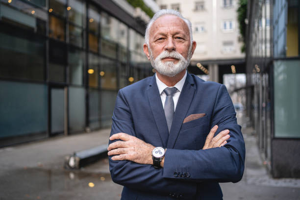 istock Smiling senior businessman 1220940017