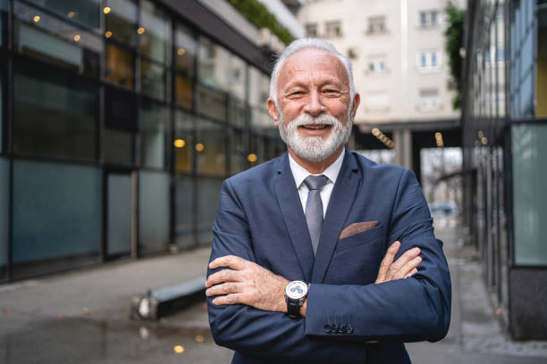 istock Smiling senior businessman 1220940063