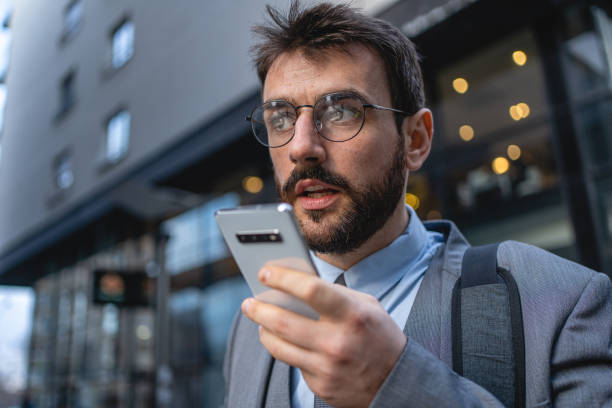 istock Modern businessman sending a voice message 1220940167