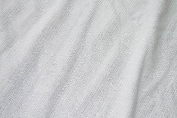 istock White linen fabric texture Creased  or background. 1220942369