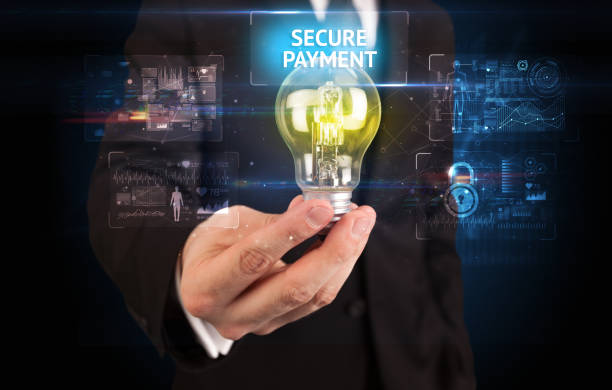 istock Businessman holding a light bulb, online security concept 1220944176