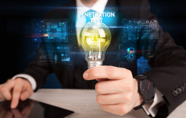istock Businessman holding a light bulb, online security concept 1220944740