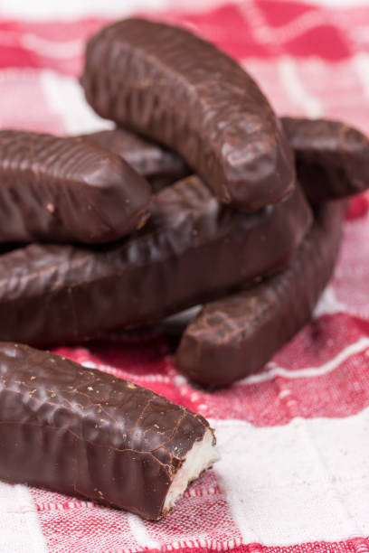 istock Bunch of chocolate bananas on the kitchen tablecloth 1220948271