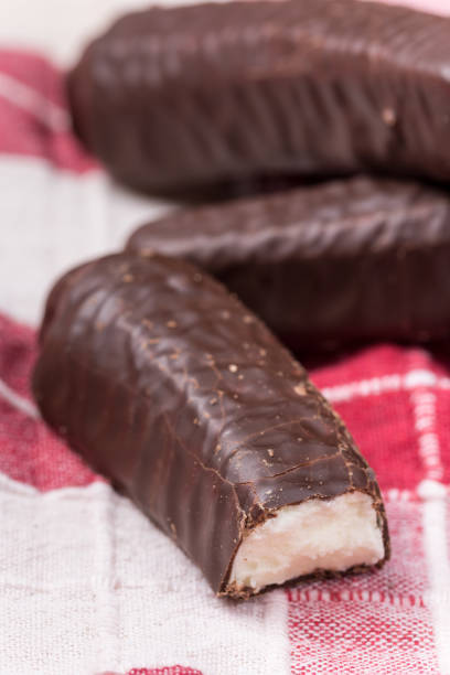 istock Bunch of chocolate bananas on the kitchen tablecloth 1220948299