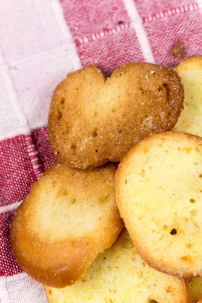 istock Crispy toast breads with cheese in macro view 1220949268