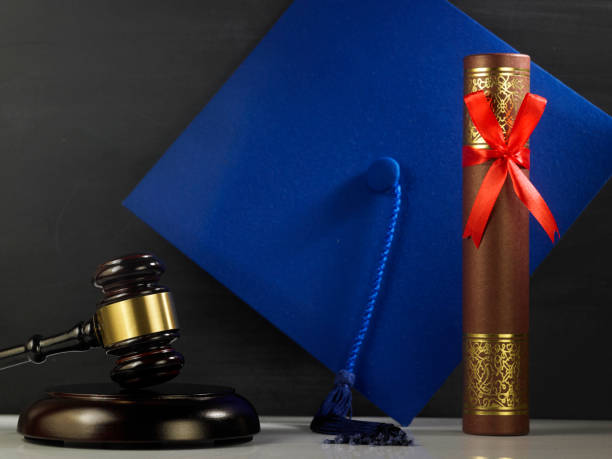 istock judge hammer and gavel with mortar board 1220949764