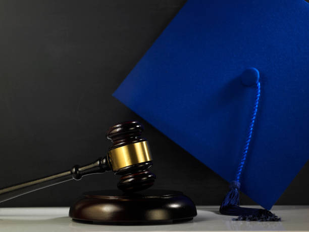 istock judge hammer and gavel with mortar board 1220949961