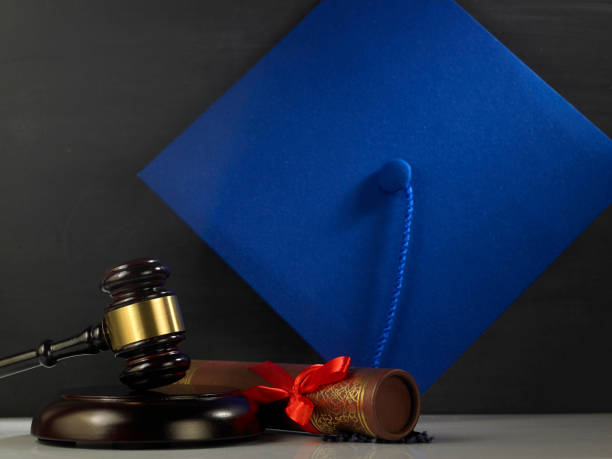 istock judge hammer and gavel with mortar board 1220950062