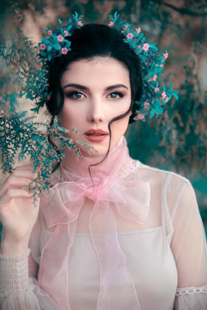 istock Young elegant woman in nature 1220955173