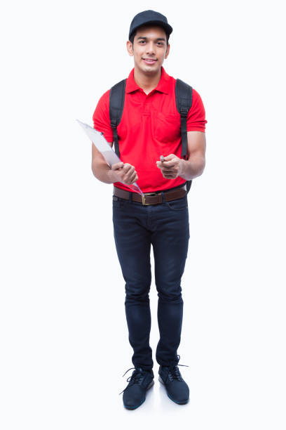 istock Indian delivery man in Red uniform stock photo 1220955903