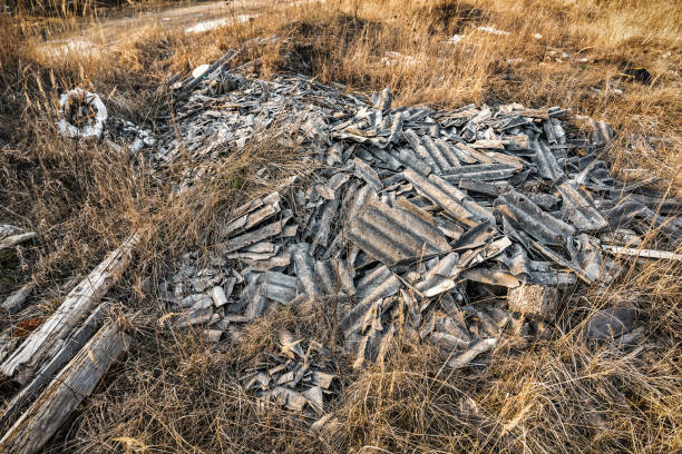 istock pile of broken asbestos slate 1220958638