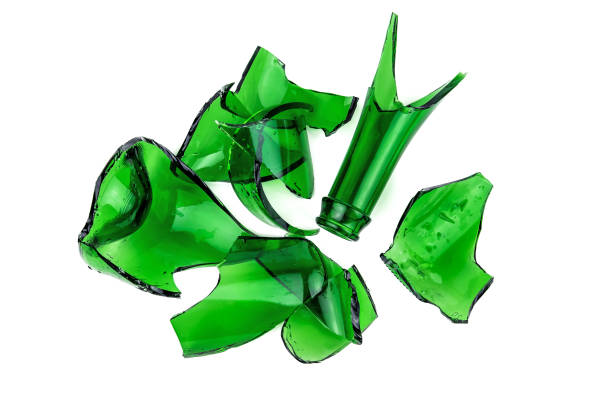 green broken bottle on white - broken glass green shattered glass imagens e fotografias de stock