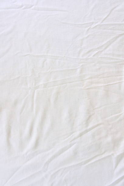istock Crumpled white linen fabric cotton for wallpaper design 1220967269