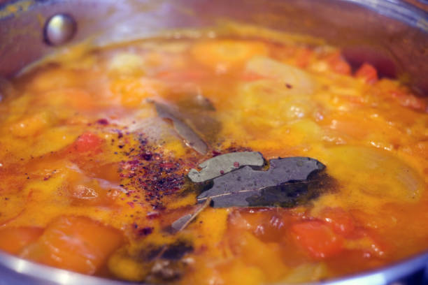 istock cooking pumpkin soup puree in a saucepan 1220972366