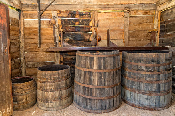 istock Old wooden barrels in cellar 1220973597