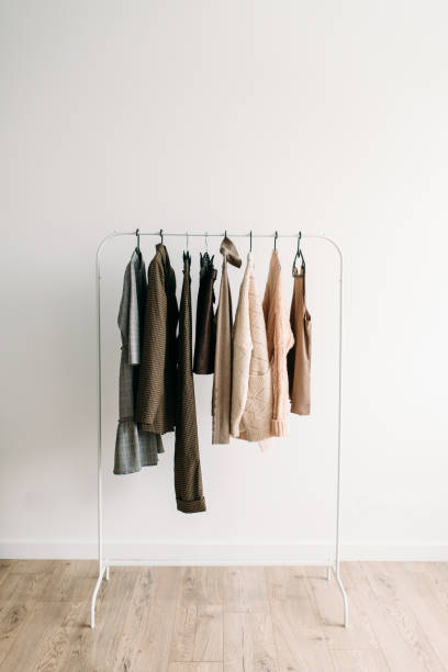istock Rack with capsule clothes in beige colors 1220974307