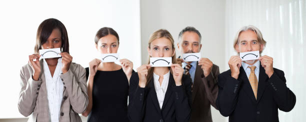 istock Group of business executives with sad emotions 1220975401