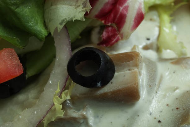 delicious food healthy black olive close up on salade onion