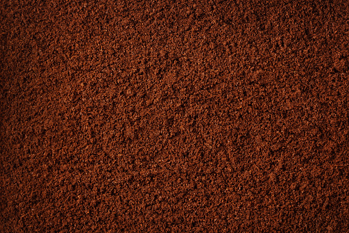 Coffee grind texture background , close up
