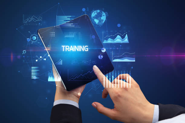 istock Businessman holding a foldable smartphone, business concept 1220981713