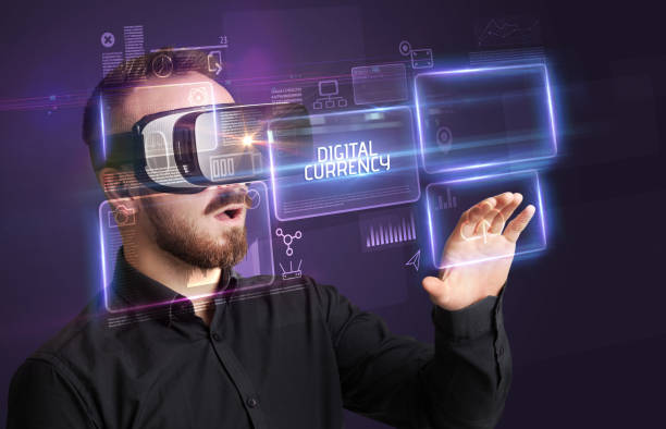 istock Businessman looking through Virtual Reality glasses, tech concept 1220982798