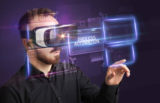 istock Businessman looking through Virtual Reality glasses, tech concept 1220983560