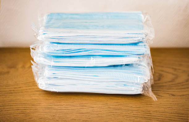 istock Packages of surgical masks 2 1220983616