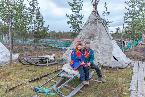 Lovozero, Russia - September 25, 2016,Man and woman, female saami, sami in national dress, saami village on the Kola Peninsula, Russia.