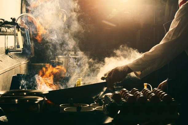istock Chef stir fry cooking 1220986957