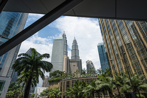 Stunning view of the Petronas Twin towers in Kuala Lumpur. The Petronas Towers are twin skyscrapers in Kuala Lumpur, Malaysia.