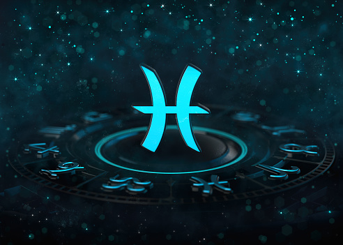 Símbolo de Piscis del Zodíaco por encima de la rueda astrológica y bokeh en la oscuridad. photo