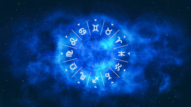 Blue astrological wheel with zodiac symbols and night starry sky. Horoscope background digital illustration. cancer astrology sign photos stock pictures, royalty-free photos & images