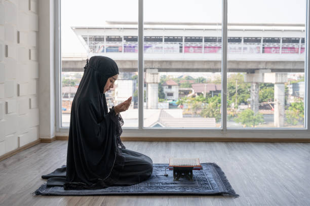 istock Asian young Muslim woman praying. 1220990211